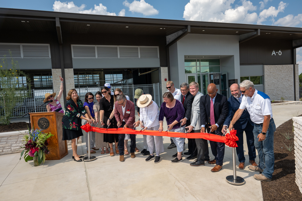 Ribbon cutting ceremony unveiling the new aquatic center.